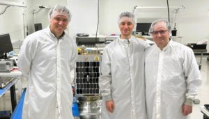 Starcloud co-founders Philip Johnston, Ezra Feilden and Adi Oltean in white suits